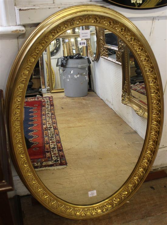 Oval giltwood wall mirror